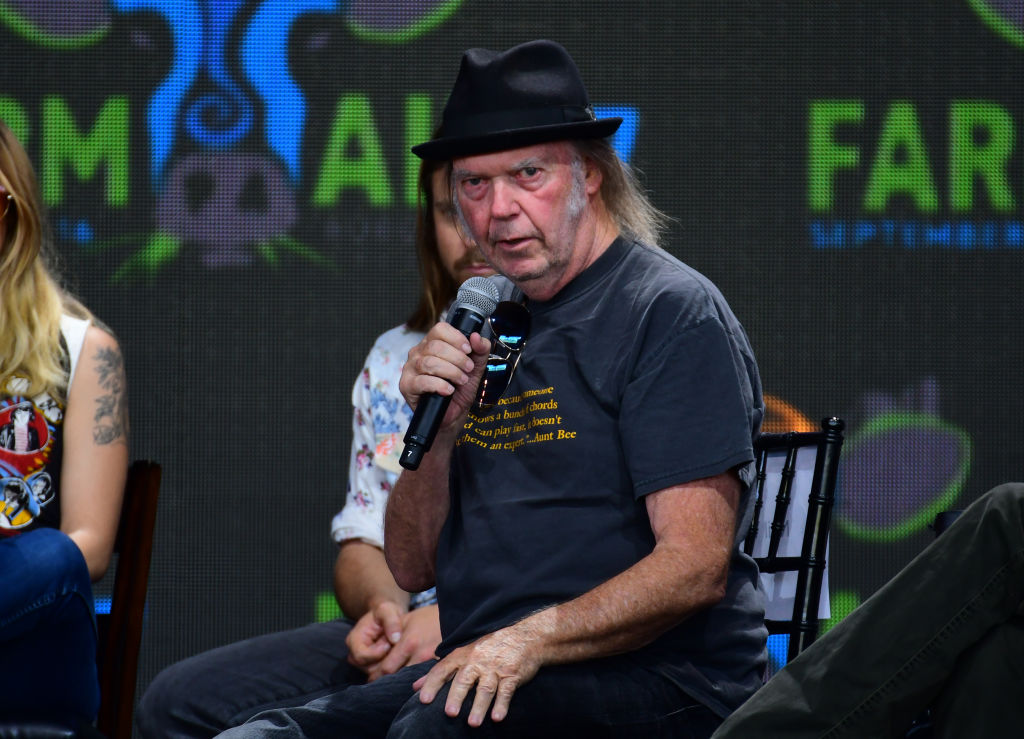 behind neil young spotify fraught with